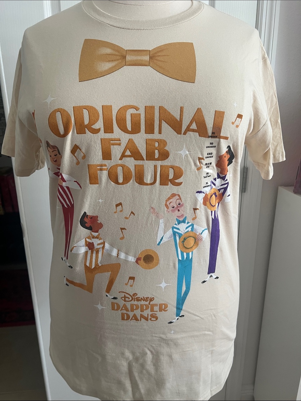 Disney Cream Tee with Gold, Blue, Purple & Black Accents